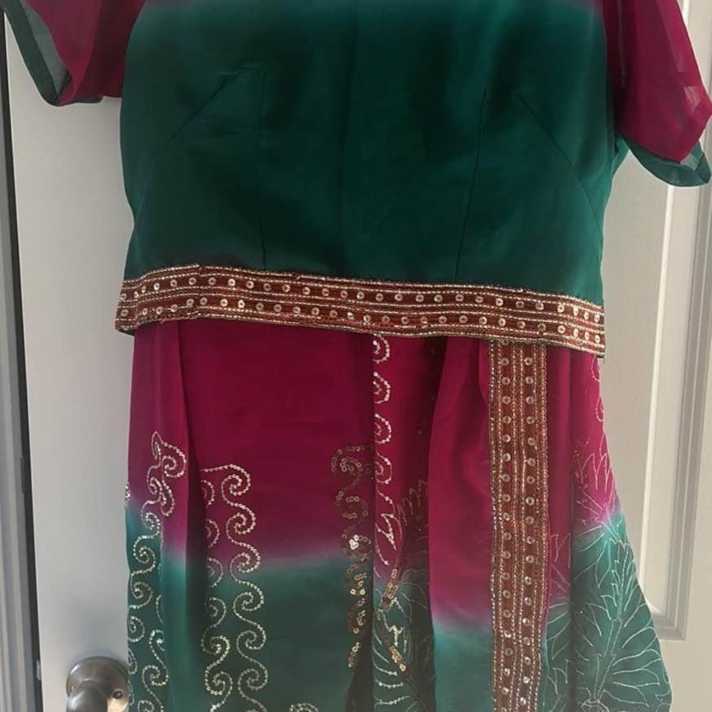 Elegant Green and Pink Saree with Gold Accents